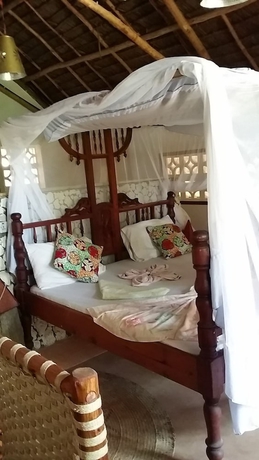 Imagen de la habitación del Hotel Mbuyuni Beach Village - Bungalows. Foto 12