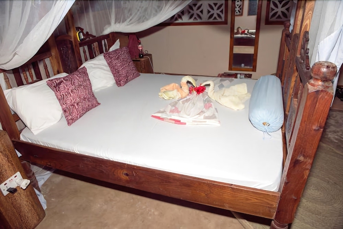 Imagen de la habitación del Hotel Mbuyuni Beach Village - Bungalows. Foto 15