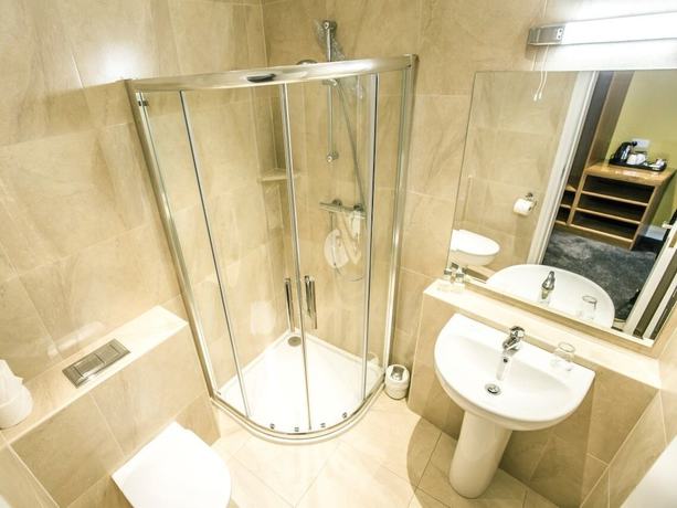 Imagen de la habitación del Hotel Mc Kevitts Village. Foto 2