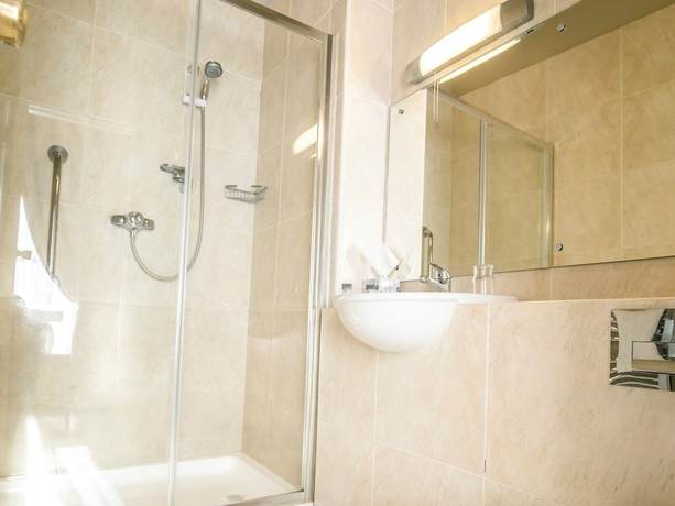 Imagen de la habitación del Hotel Mc Kevitts Village. Foto 3