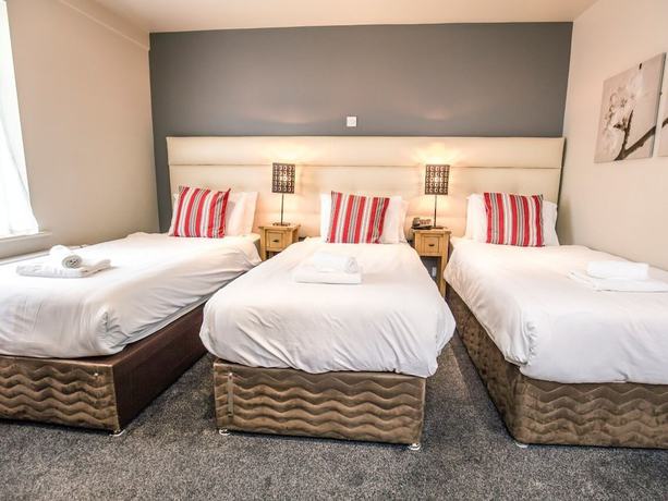 Imagen de la habitación del Hotel Mc Kevitts Village. Foto 8