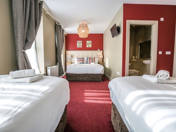 Imagen de la habitación del Hotel Mc Kevitts Village. Foto 10