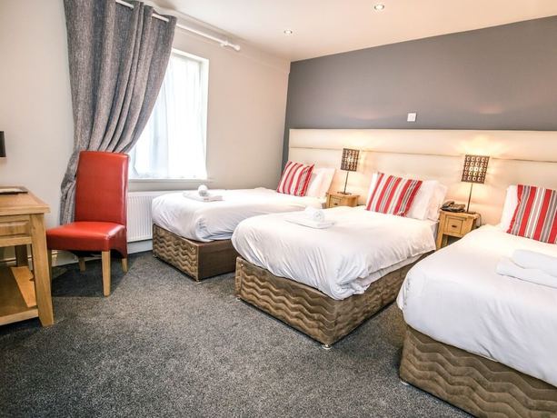 Imagen de la habitación del Hotel Mc Kevitts Village. Foto 15