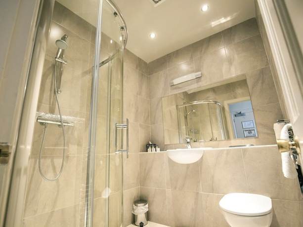 Imagen de la habitación del Hotel Mc Kevitts Village. Foto 16