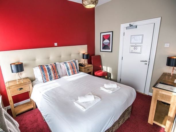 Imagen de la habitación del Hotel Mc Kevitts Village. Foto 17
