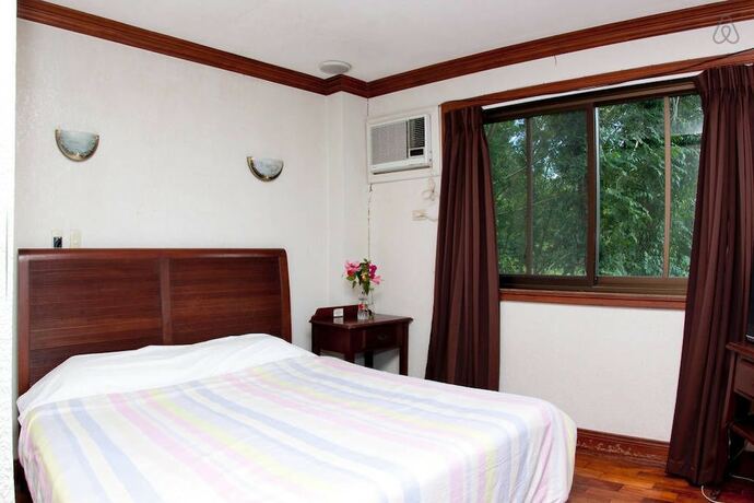 Imagen de la habitación del Hotel Mc Mountain Home Apartelle. Foto 21