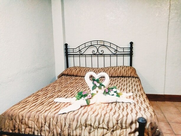 Imagen de la habitación del Hotel Mc Mountain Home Apartelle. Foto 22