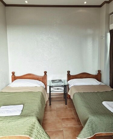 Imagen de la habitación del Hotel Mc Mountain Home Apartelle. Foto 26