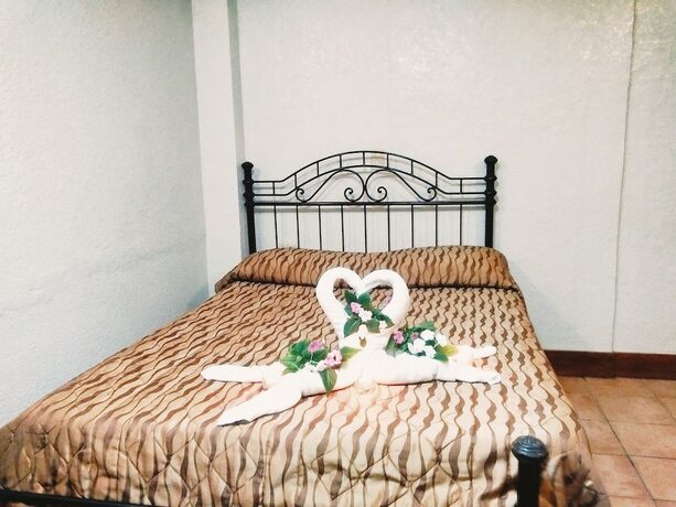 Imagen de la habitación del Hotel Mc Mountain Home Apartelle. Foto 37