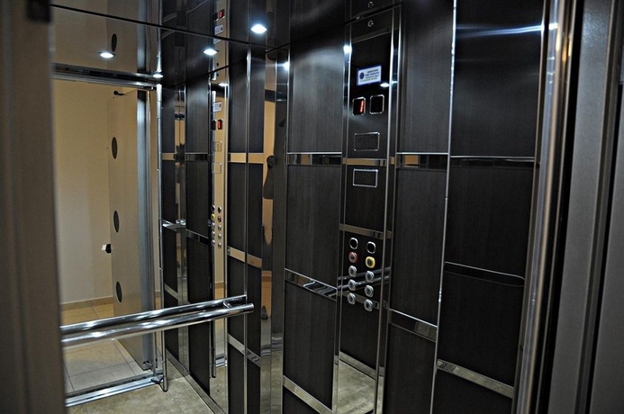 Imagen de los interiores del Hotel Mc Queen Rooms and Apartments. Foto 11