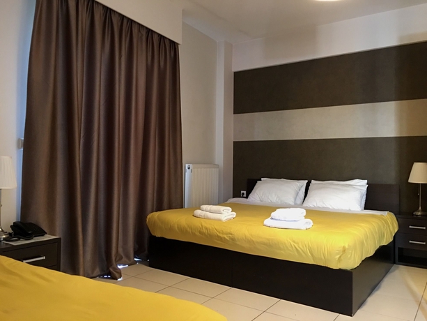 Imagen de la habitación del Hotel Mc Queen Rooms and Apartments. Foto 7