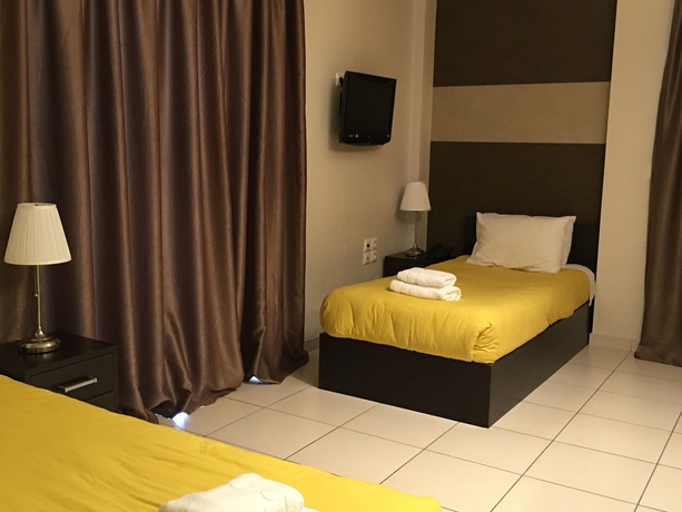 Imagen de la habitación del Hotel Mc Queen Rooms and Apartments. Foto 8