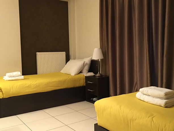 Imagen de la habitación del Hotel Mc Queen Rooms and Apartments. Foto 9