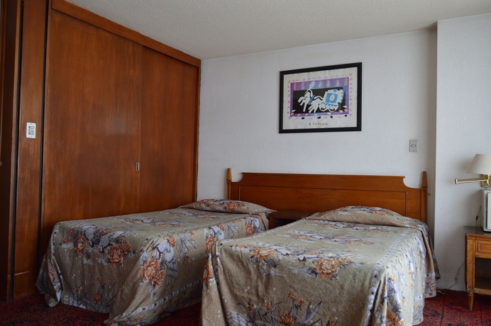 Imagen de la habitación del Hotel Mc Suites Mexico City. Foto 8