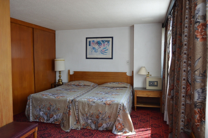 Imagen de la habitación del Hotel Mc Suites Mexico City. Foto 9