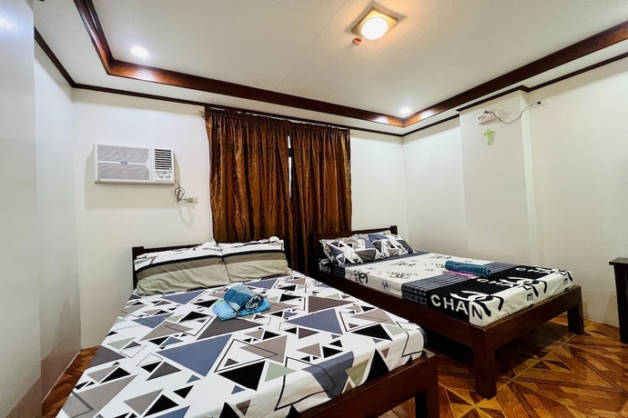 Imagen de la habitación del Hotel Mc\'S L Transient House. Foto 4