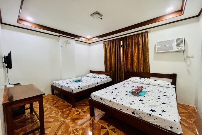 Imagen de la habitación del Hotel Mc\'S L Transient House. Foto 5