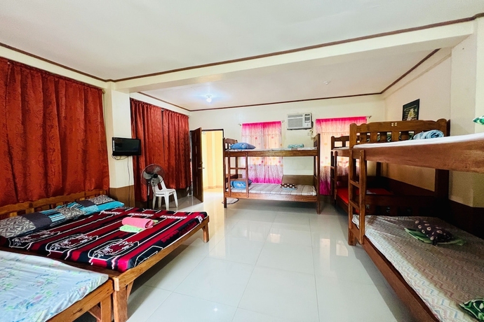 Imagen de la habitación del Hotel Mc\'S L Transient House. Foto 13