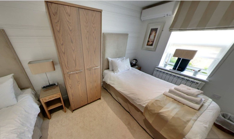 Imagen de la habitación del Hotel Mccafferty’s Guesthouse. Foto 8