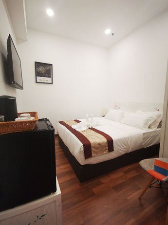 Imagen de la habitación del Hotel Mclane Boutique. Foto 11