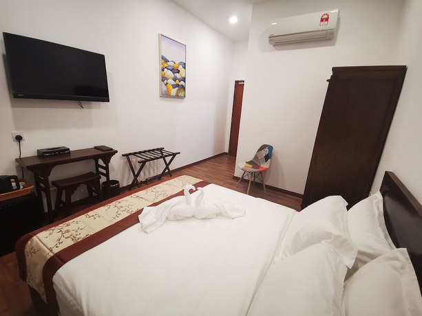 Imagen de la habitación del Hotel Mclane Boutique. Foto 13