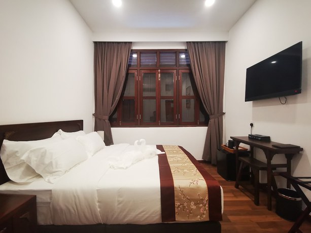 Imagen de la habitación del Hotel Mclane Boutique. Foto 14