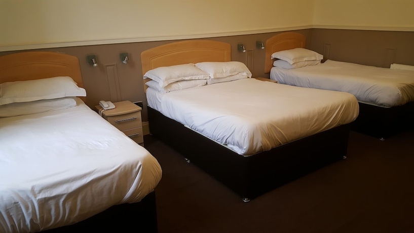 Imagen de la habitación del Hotel Mclays Guest House. Foto 9