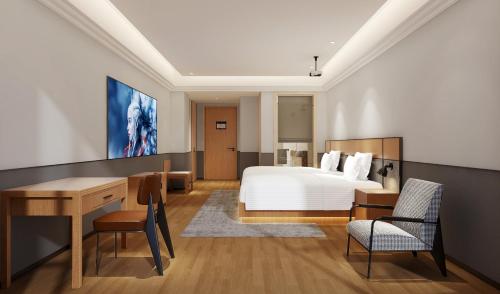 Imagen de la habitación del Hotel Mcsrh-Chongqing Guanyinqiao. Foto 16