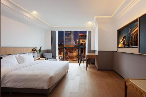 Imagen de la habitación del Hotel Mcsrh-Chongqing Guanyinqiao. Foto 20