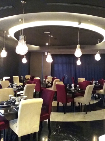 Imagen del bar/restaurante del Hotel Md By Gewan. Foto 4