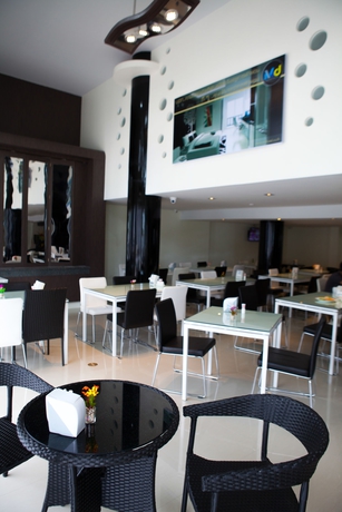 Imagen del bar/restaurante del Hotel Md Grand. Foto 2