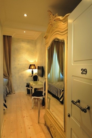Imagen de la habitación del Hotel Mdm Guesthouse. Foto 1