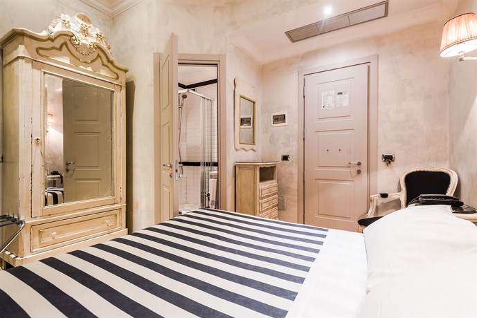 Imagen de la habitación del Hotel Mdm Guesthouse. Foto 14