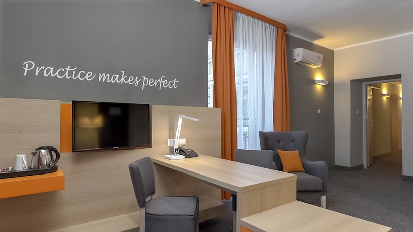 Imagen de la habitación del Hotel Mdm Warsaw. Foto 12