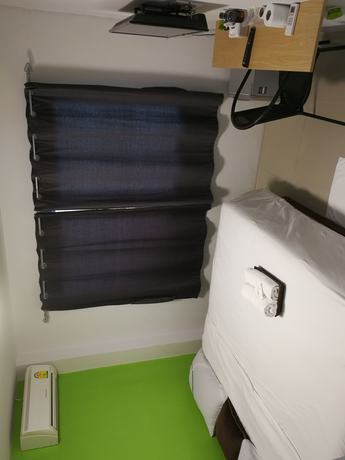 Imagen de la habitación del Hotel Me Home. Foto 7