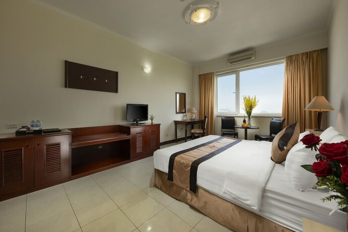 Imagen de la habitación del Hotel Me Linh. Foto 13