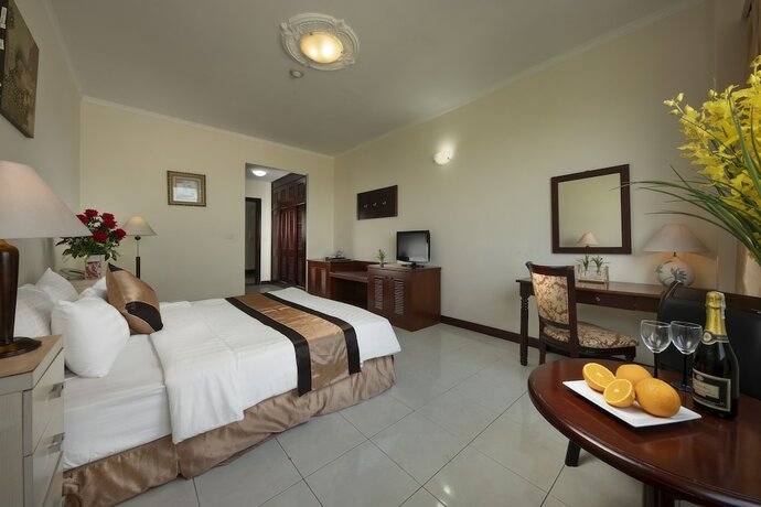 Imagen de la habitación del Hotel Me Linh. Foto 14