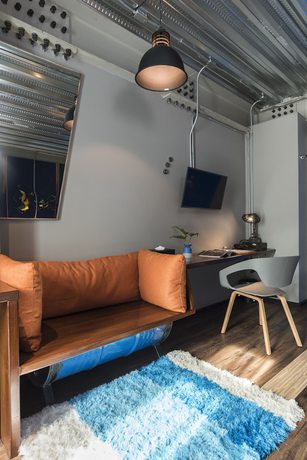 Imagen de la habitación del Hotel MeStyle Garage. Foto 7