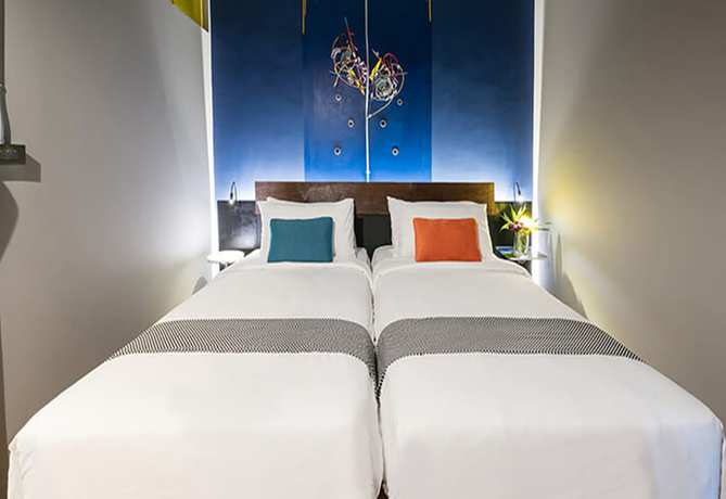 Imagen de la habitación del Hotel MeStyle Garage. Foto 10