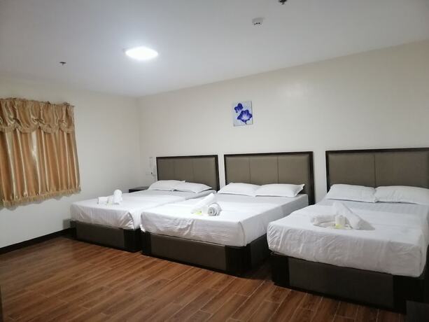 Imagen de la habitación del Hotel Meaco Royal-Binan. Foto 13