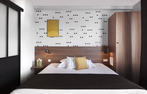 Imagen de la habitación del Hotel M&eacute;tropole Centre Ville. Foto 6