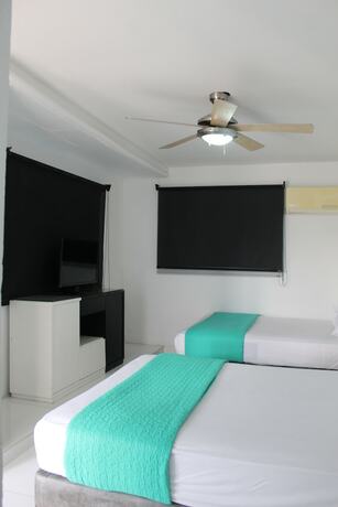 Imagen de la habitación del Hotel Med Taganga. Foto 19