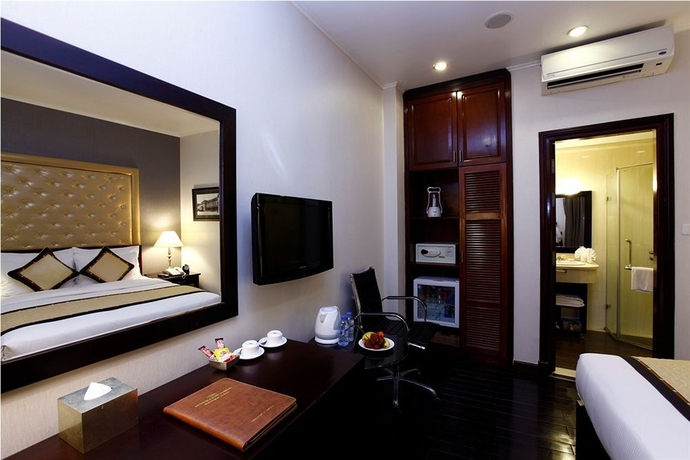 Imagen de la habitación del Hotel Medallion Hanoi. Foto 13