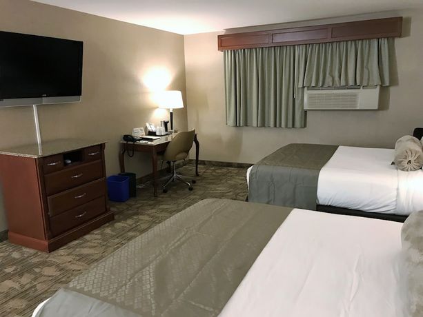 Imagen de la habitación del Hotel Medallion Inn And Suites. Foto 6