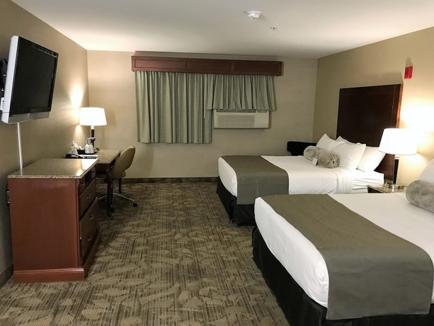 Imagen de la habitación del Hotel Medallion Inn And Suites. Foto 17