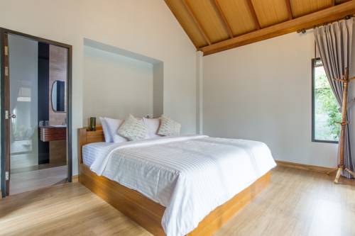 Imagen de la habitación del Hotel Medee Resort. Foto 15