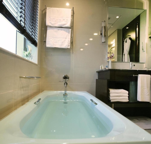 Imagen de la habitación del Hotel Media Rotana. Foto 8