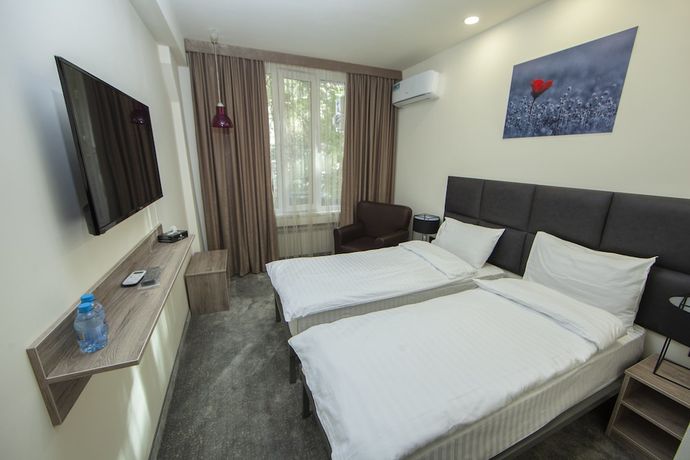 Imagen de la habitación del Hotel Median City Center Yerevan. Foto 7