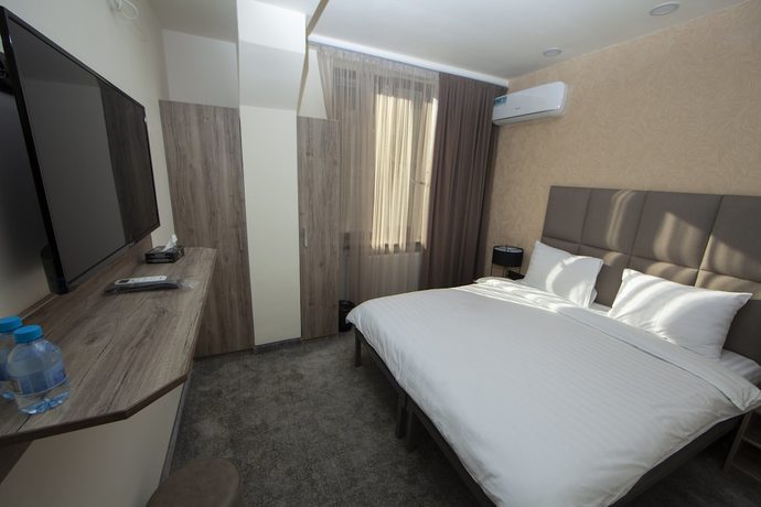 Imagen de la habitación del Hotel Median City Center Yerevan. Foto 15