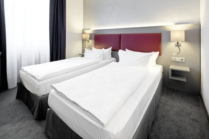 Imagen de la habitación del Hotel Median. Foto 11